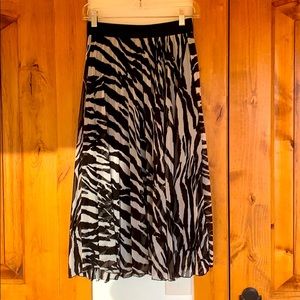 Mid-calf black and white pleated skirt